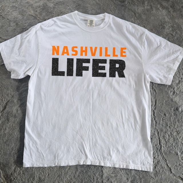 Nashville Lifer shirt, flat on concrete